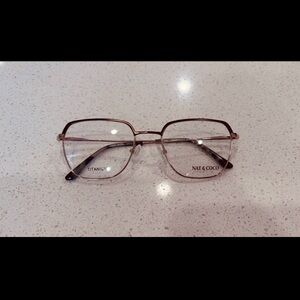 BRAND NEW AUTHENTIC NAT&COCO EYEGLASSES MODEL 3013 in Brown